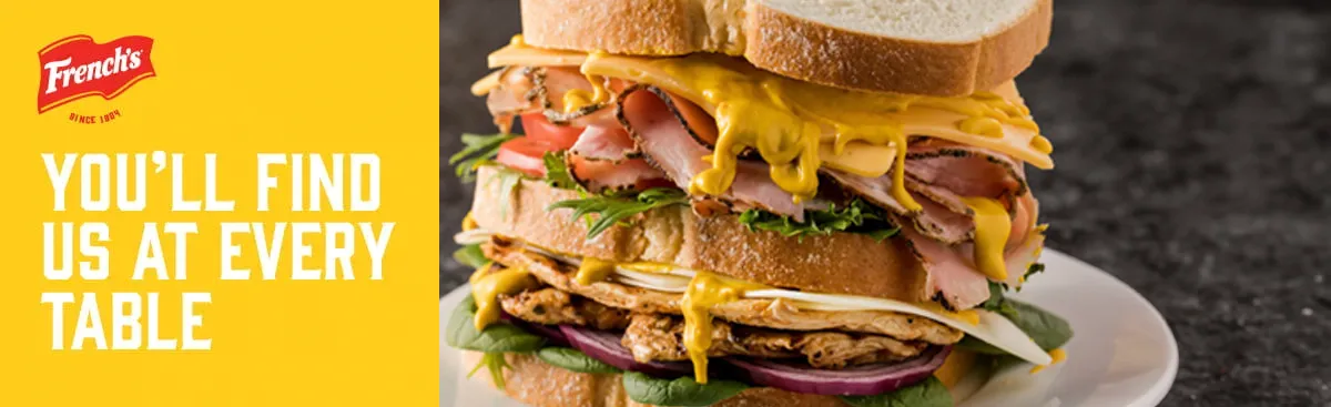 French's Hero Banner featuring a club sandwich with mustard