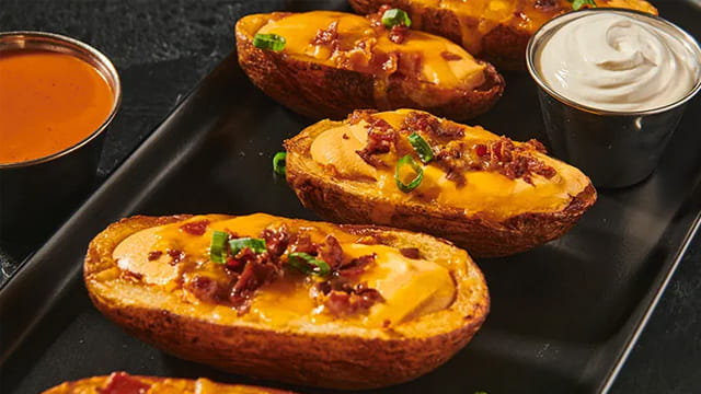 Cheesy Buffalo Bacon Potato Skins