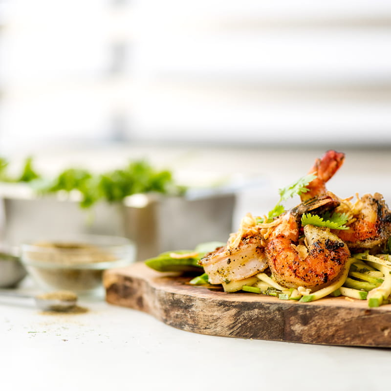 Grilled Black Pepper Shrimp with Green Mango and Avocado Slaw