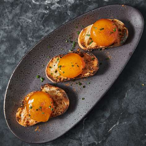 vietnamese cajun soft cured egg crostini