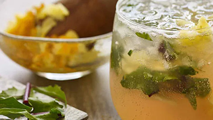 pineapple_turmeric_mocktail_with_muddled_dandelion_greens