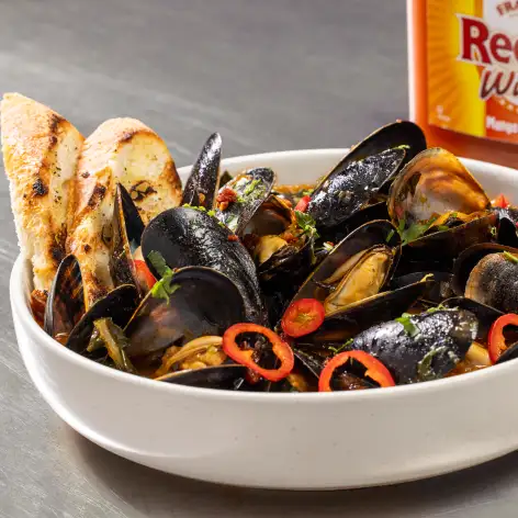 Steamed Mussels with Spicy Mango White Wine Broth