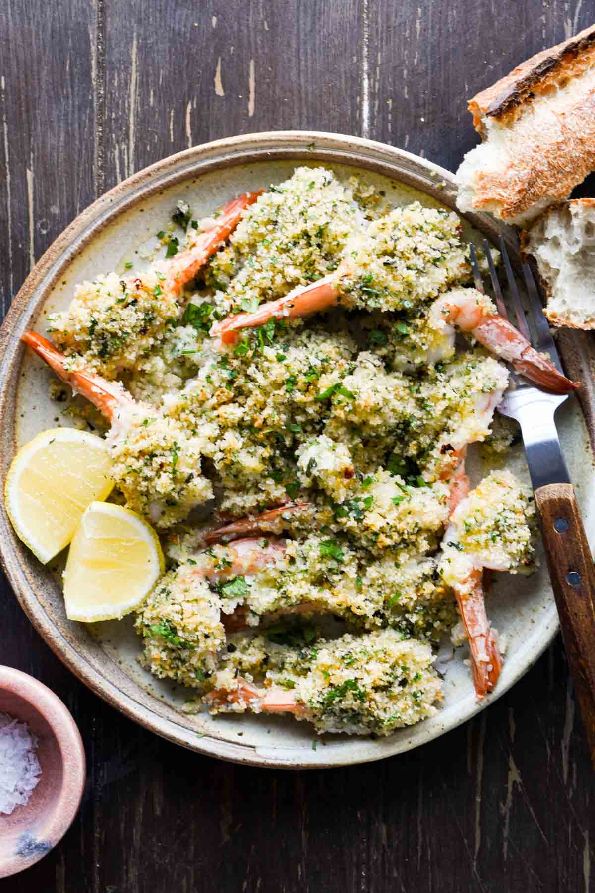 Shrimp oreganata on a plate.