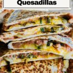 Refried bean quesadillas stacked.
