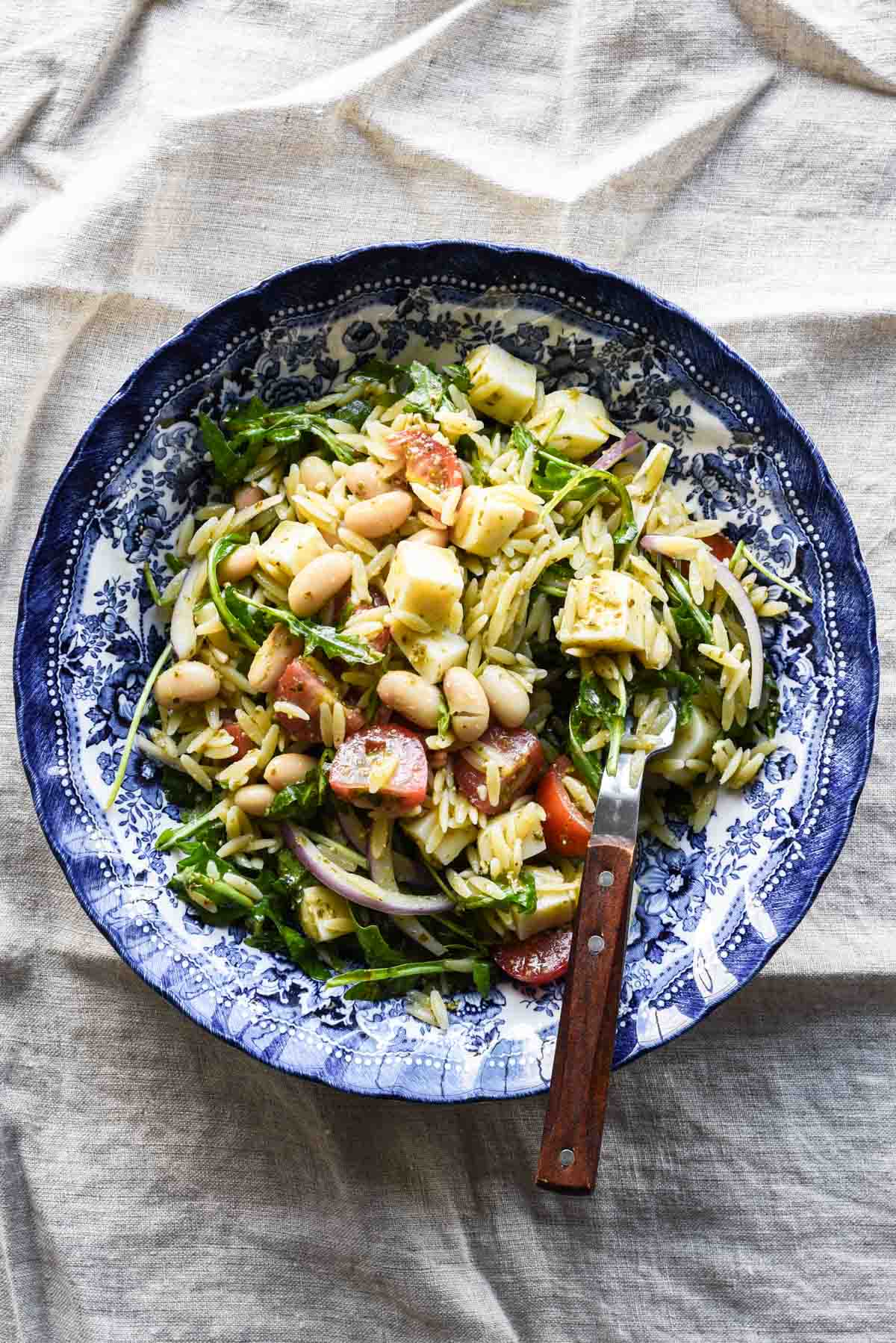 Single serving of pasta salad in an antique bowl.