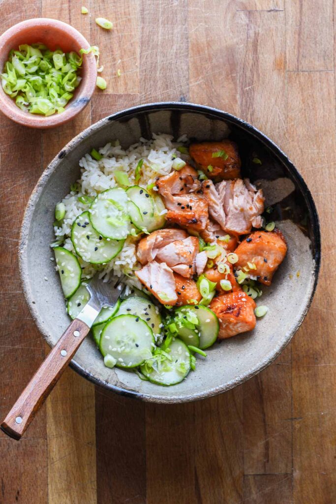 Salmon bowls being eaten.
