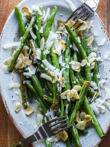 Roasted green beans with parmesan and garlic.