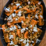 Roasted honeynut squash with brown butter, walnuts, and feta.